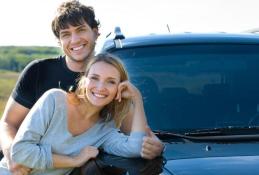 Portrait happy, smiling woman sitting in the car looking out windows.jpg