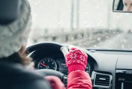 Portrait happy, smiling woman sitting in the car looking out windows.jpg