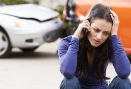 Portrait happy, smiling woman sitting in the car looking out windows.jpg